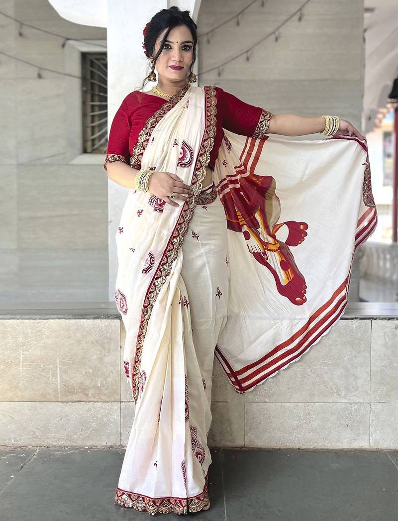 Off white ethnic motifs beads and stones block print saree
