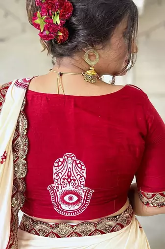 Off white ethnic motifs beads and stones block print saree