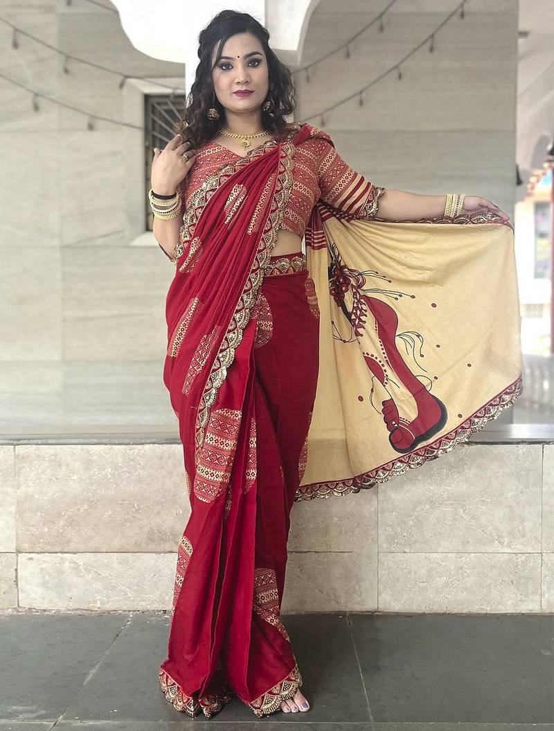 Red ethnic motifs beads and stones block print saree