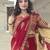 Red ethnic motifs beads and stones block print saree