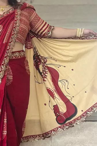 Red ethnic motifs beads and stones block print saree