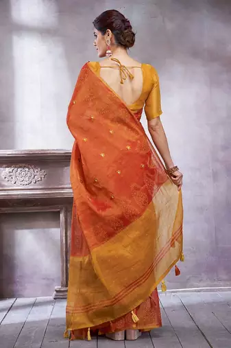 Rust ethnic motifs woven design linen blend sarees