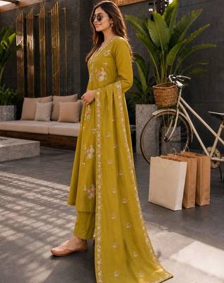 women mustard chanderi embroidered a-line kurta with trouser & dupatta 4