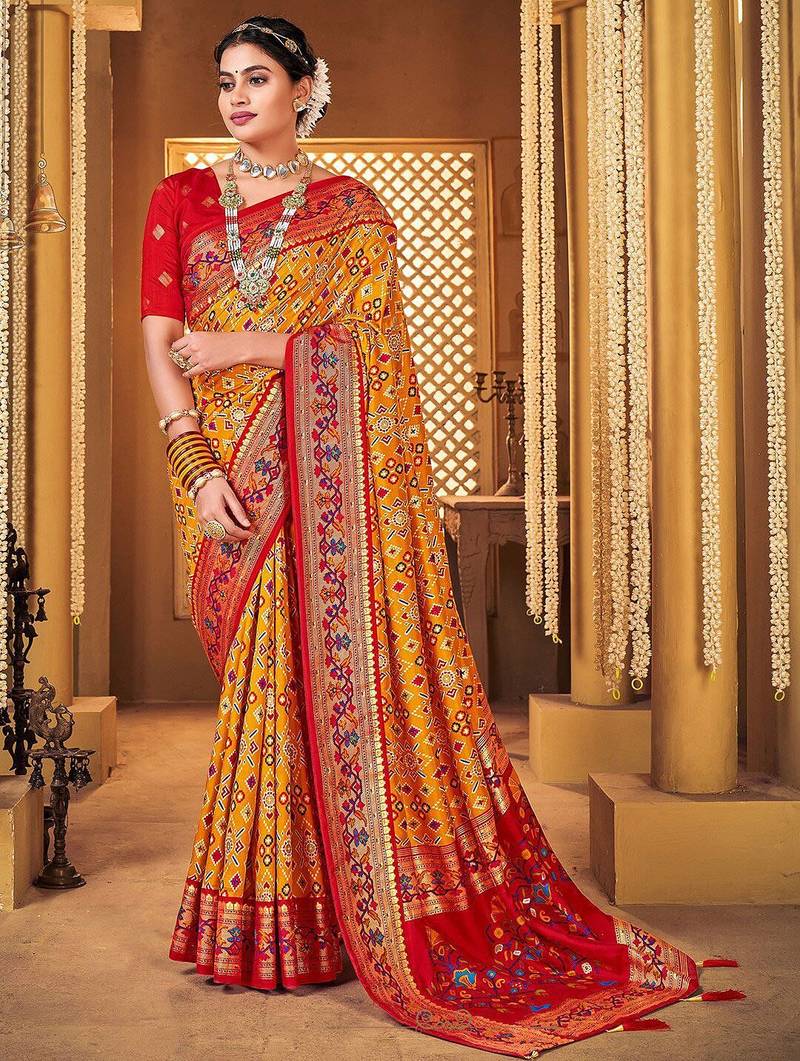 Mustard ethnic motifs printed zari patola saree