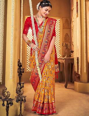 Mustard ethnic motifs printed zari patola saree 2