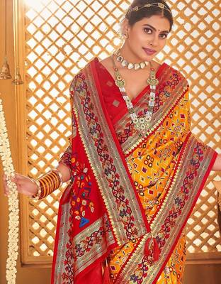 Mustard ethnic motifs printed zari patola saree 3