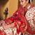 Off white ethnic motifs woven design zari patola saree
