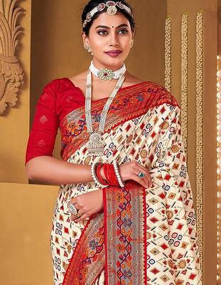 Off white ethnic motifs woven design zari patola saree 3