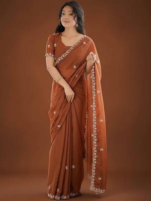 Brown ethnic motifs embroidered  georgette heavy work saree 1