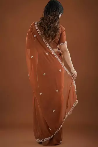 Brown ethnic motifs embroidered  georgette heavy work saree