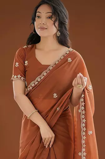Brown ethnic motifs embroidered  georgette heavy work saree