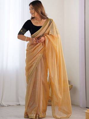 Gold sequinned net designer saree 1