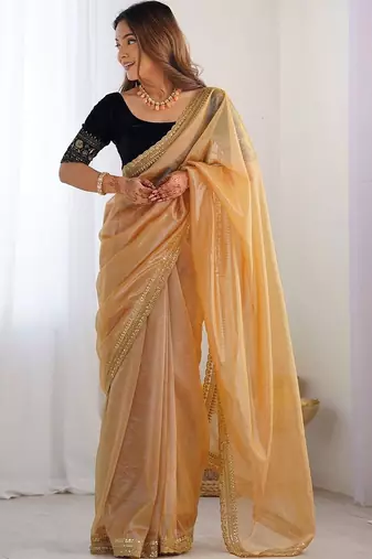 Gold sequinned net designer saree