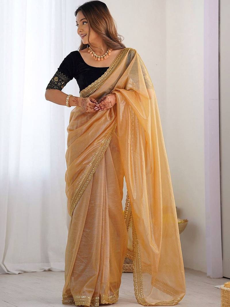 Gold sequinned net designer saree