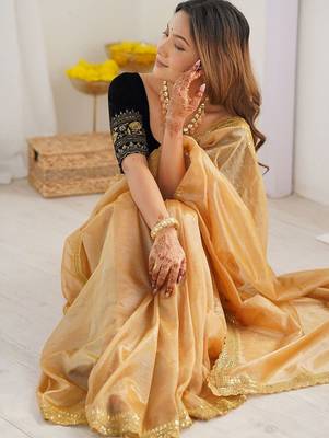 Gold sequinned net designer saree 2
