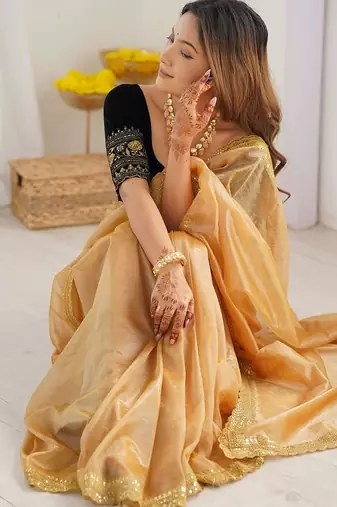 Gold sequinned net designer saree