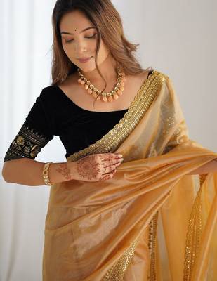 Gold sequinned net designer saree 4