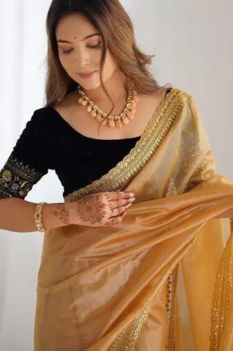 Gold sequinned net designer saree