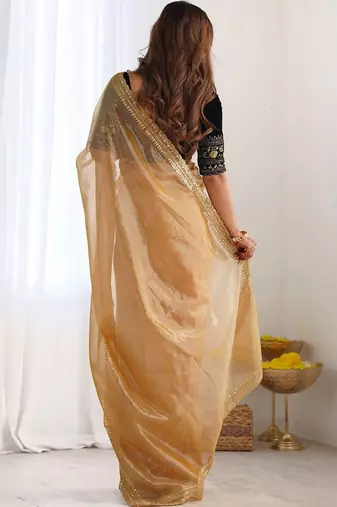 Gold sequinned net designer saree