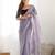 Purple sequinned net saree