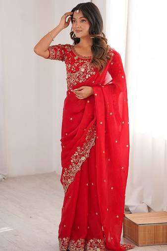 Red ethnic motifs embroidered satin heavy work saree