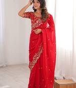 Red ethnic motifs embroidered satin heavy work saree
