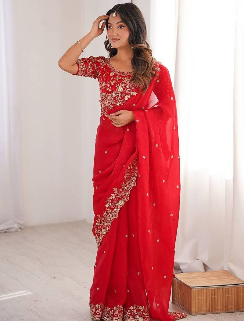 Red ethnic motifs embroidered satin heavy work saree