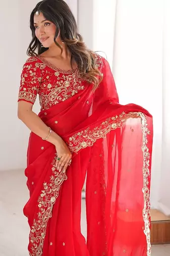 Red ethnic motifs embroidered satin heavy work saree
