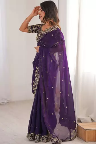 Purple ethnic motifs embroidered satin heavy work saree