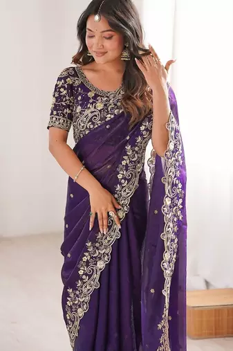 Purple ethnic motifs embroidered satin heavy work saree