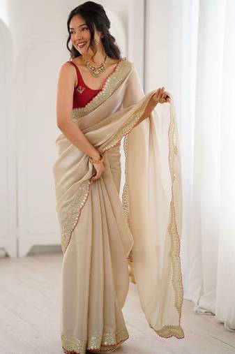 Cream embellished sequinned satin heavy work saree