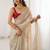 Cream embellished sequinned satin heavy work saree