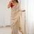 Cream embellished sequinned satin heavy work saree