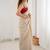 Cream embellished sequinned satin heavy work saree
