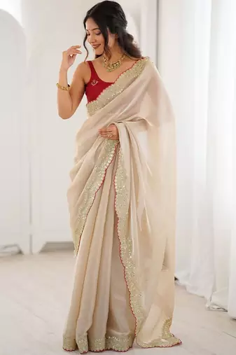 Cream embellished sequinned satin heavy work saree