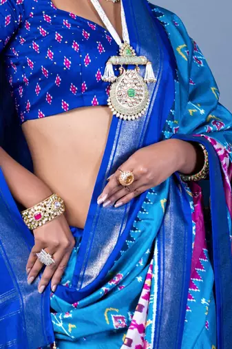 Blue ethnic motifs silk blend pochampally saree