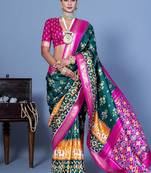 Teal ethnic motifs silk blend pochampally saree