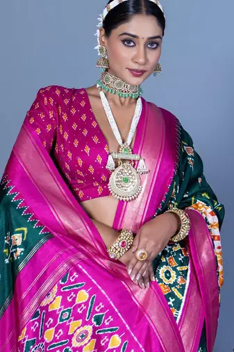 Teal ethnic motifs silk blend pochampally saree