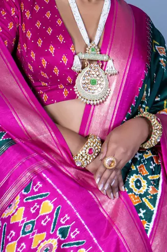 Teal ethnic motifs silk blend pochampally saree