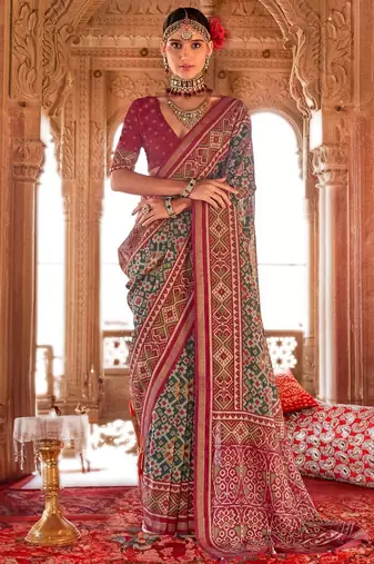 Sea green ethnic motifs silk blend patola saree