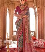 Sea green ethnic motifs silk blend patola saree