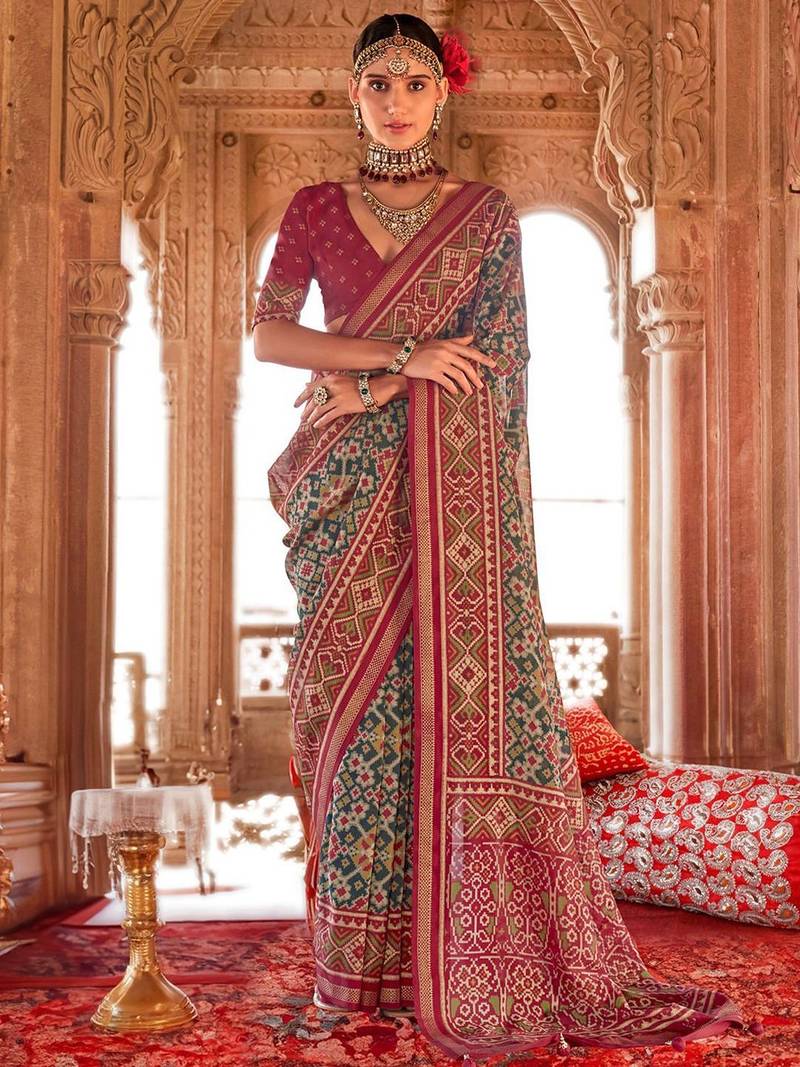 Sea green ethnic motifs silk blend patola saree