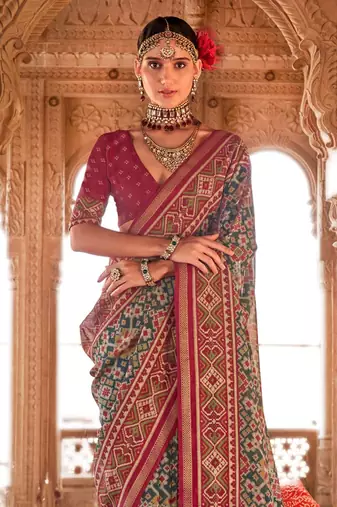 Sea green ethnic motifs silk blend patola saree