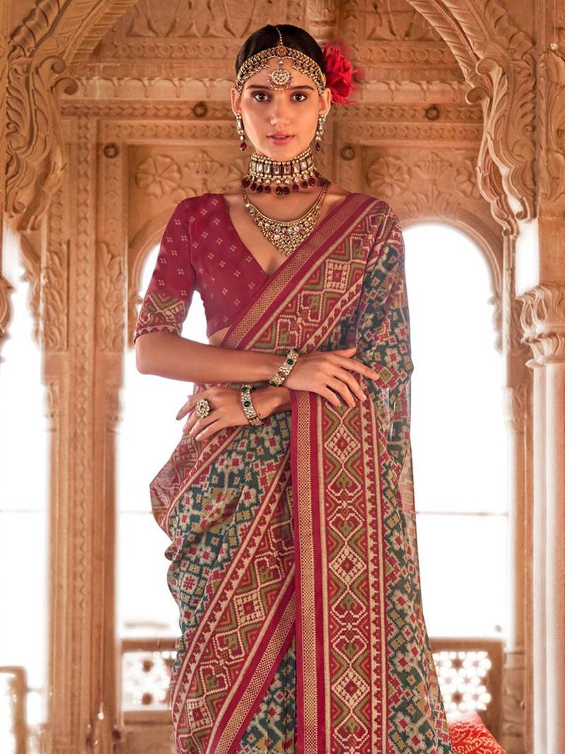 Sea green ethnic motifs silk blend patola saree