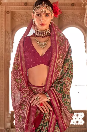 Sea green ethnic motifs silk blend patola saree