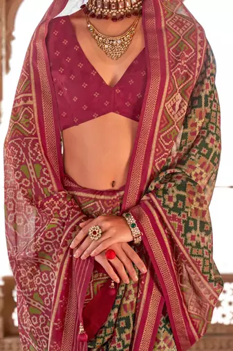 Sea green ethnic motifs silk blend patola saree