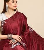 Maroon maroon ethnic motifs embroidered satin saree