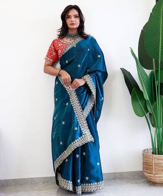 Teal floral embroidered organza saree 1