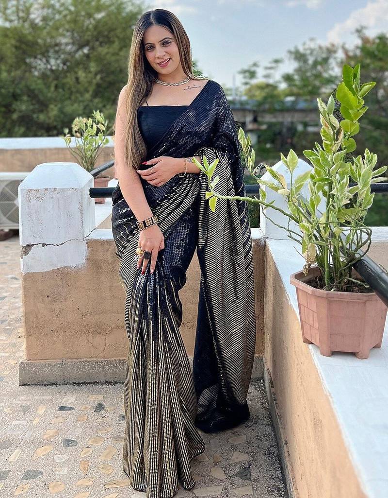 Black black embellished sequinned  georgette saree