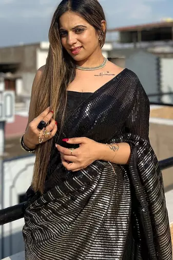 Black black embellished sequinned  georgette saree